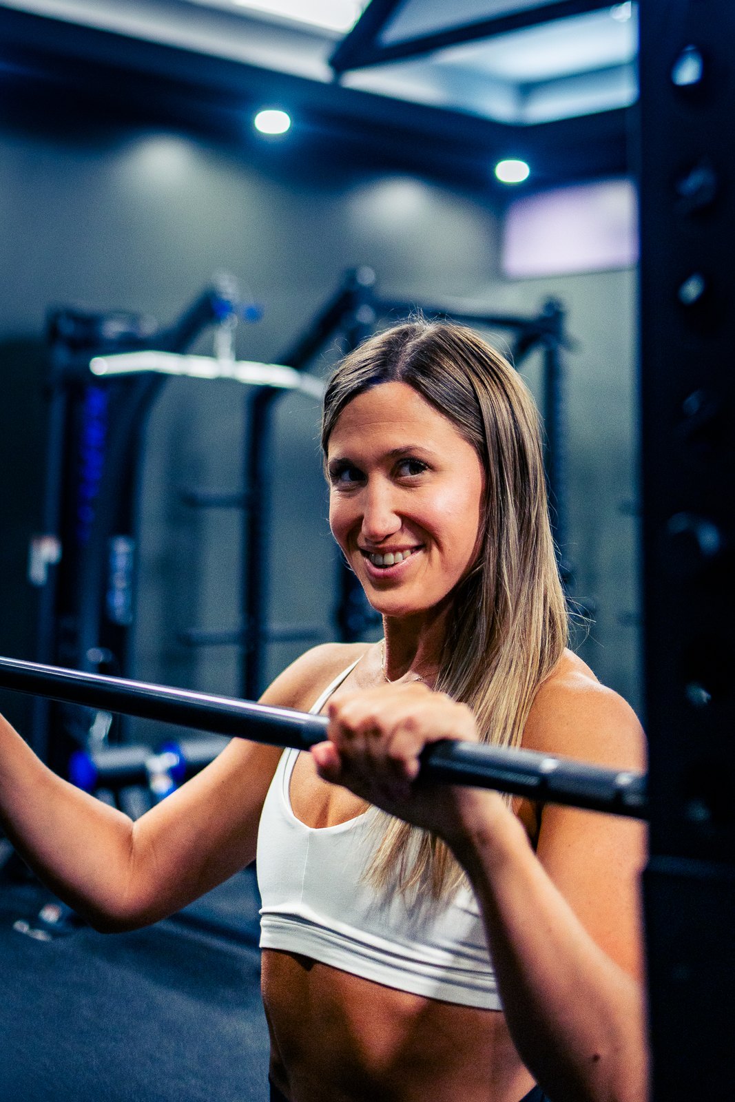 Nicole Vanderhorn training with a barbell in the Urban Fitness Ottawa studio.